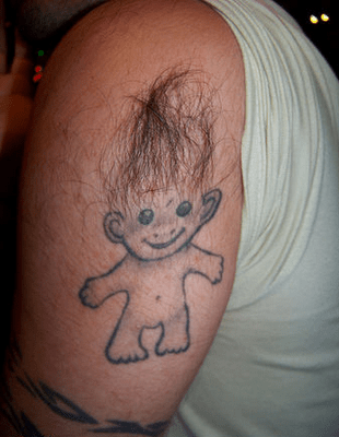creative use of body hair for this tattoo