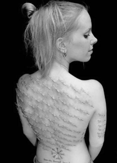extreme piercing on back