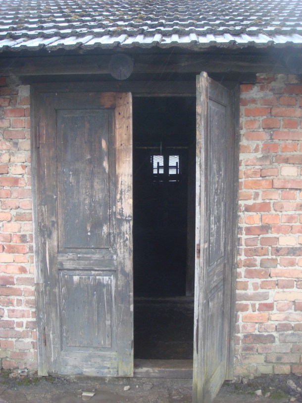 Door at Birkenau to living quarters for prisoners and slave laborers