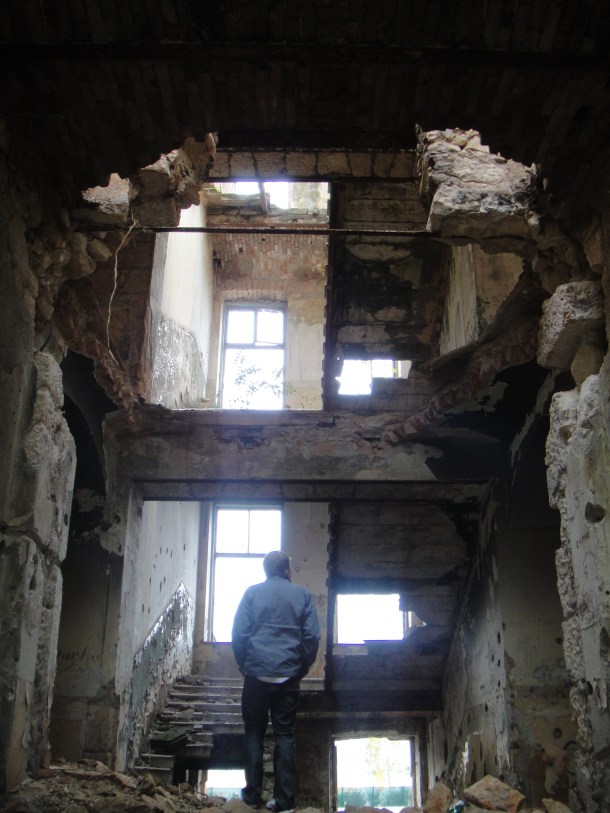 Andrew Drury surveying war damage in Mostar, Bosnia