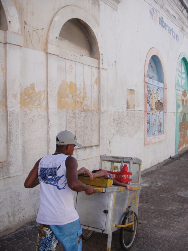 child for sale outside Petrobras terminal in Maceio