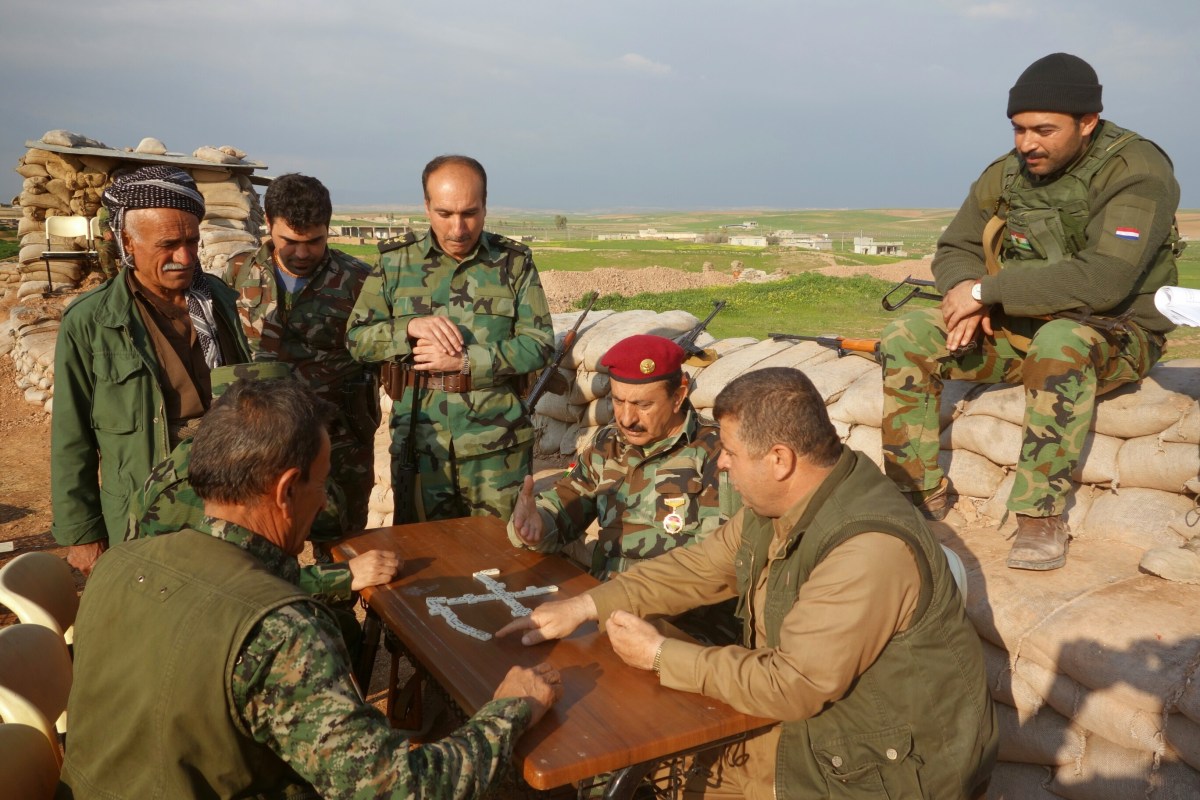 Commander-sarhad-betwata-takes-the-time-to-have-fun-with-his-fighters-in-order-to-keep-morale-up-as-they-await-the-order-to-invade-mosul