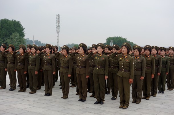North Korean soldiers salute statues of the country’s two previous dictators from the Kim family, Kim Il-sung and Kim Jong-Il  